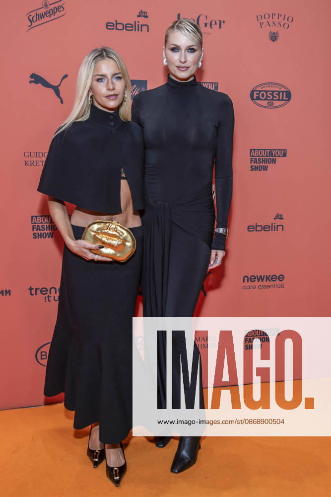 ABB ABOUTYOU Caroline Daur and Lena Gercke as guests on the orange carpet at the ABOUT YOU Opera Fashion Show at the Admiralspalast on October 7, 2026, in Berlin, Germany