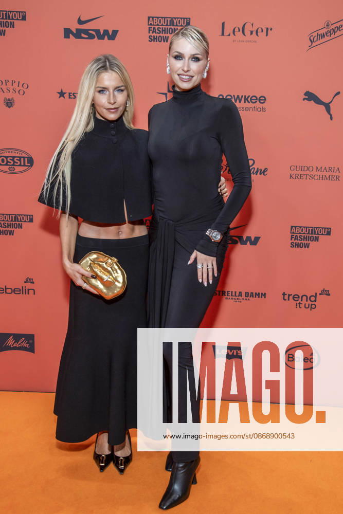 ABB ABOUTYOU Caroline Daur and Lena Gercke as guests on the orange carpet at the ABOUT YOU Opera Fashion Show at the Admiralspalast on October 7, 2026, in Berlin, Germany