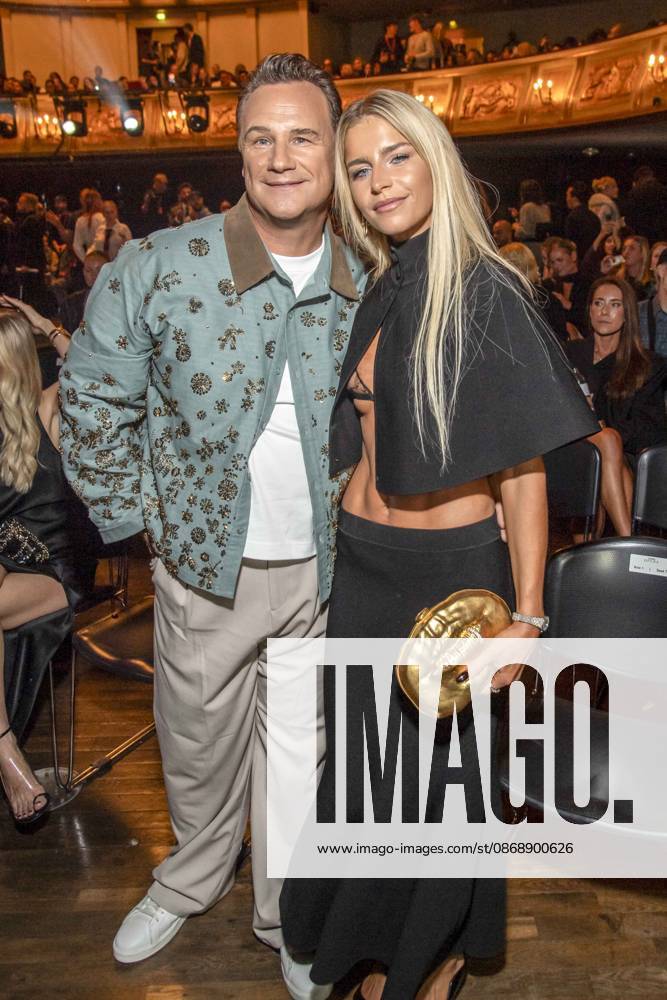 ABB ABOUTYOU Guido Maria Kretschmer and Caroline Daur attend the ABOUT YOU Opera Fashion Show at the Admiralspalast on October 7, 2026, in Berlin, Germany