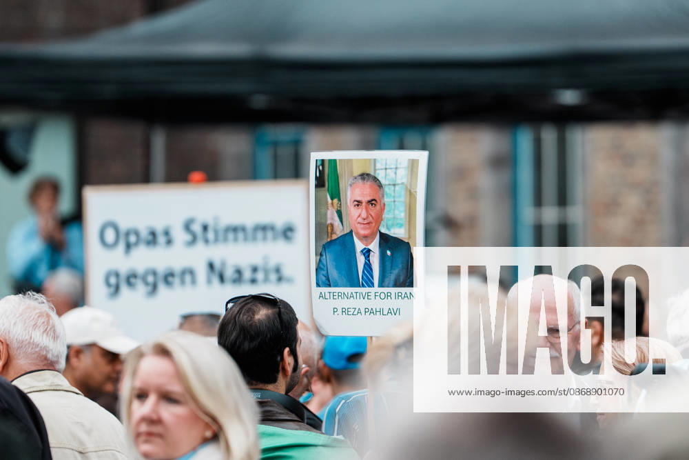Rally in Düsseldorf marking the anniversary of Hamas’s terrorist attack on Israel on October 7, 2023, and protesting anti-Semitism; sign reading Reza Pahlavi, Iran