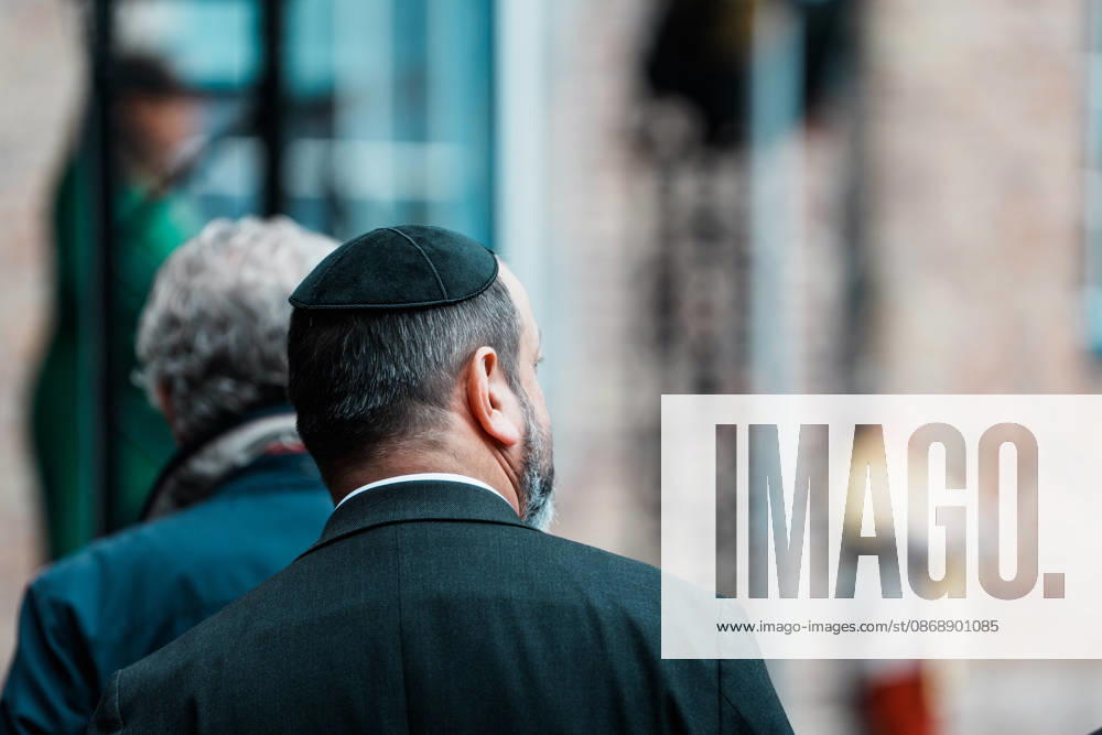 Rally in Düsseldorf marking the anniversary of Hamas’s terrorist attack on Israel on October 7, 2023, and protesting anti-Semitism; man wearing a kippah