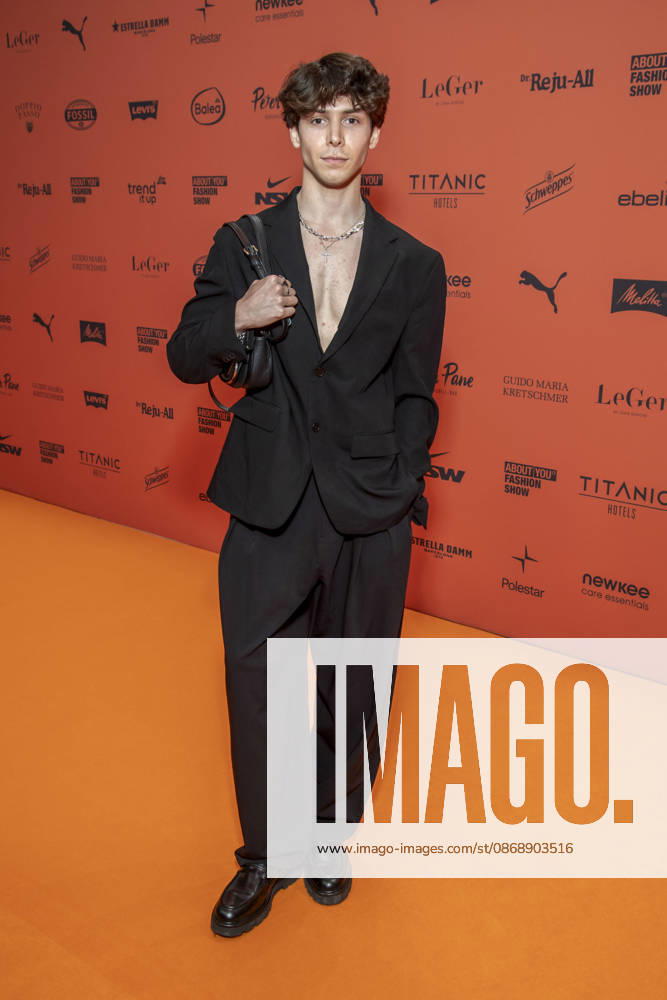 ABB ABOUTYOU Sascha Dombrowski as a guest on the orange carpet at the ABOUT YOU Opera Fashion Show at the Admiralspalast on October 7, 2026, in Berlin, Germany