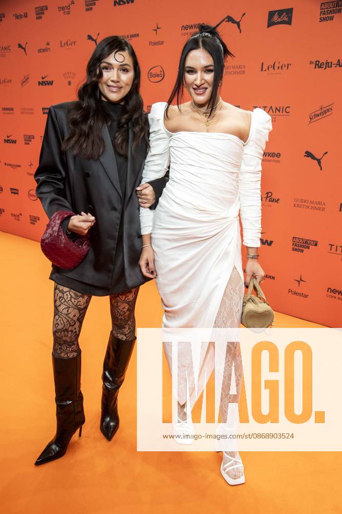 ABB ABOUTYOU Anna Maria Damm and Katharina Damm as guests on the orange carpet at the ABOUT YOU Opera Fashion Show at the Admiralspalast on October 7, 2026, in Berlin, Germany