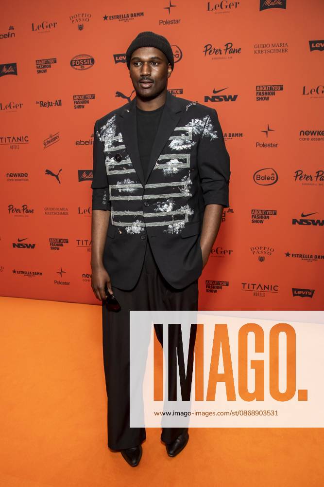 ABB ABOUTYOU Marvin De Graft as a guest on the orange carpet at the ABOUT YOU Opera Fashion Show at the Admiralspalast on October 7, 2026, in Berlin, Germany