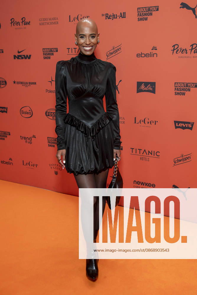 ABB ABOUTYOU Sharon Battiste as a guest on the orange carpet at the ABOUT YOU Opera Fashion Show at the Admiralspalast on October 7, 2026, in Berlin, Germany