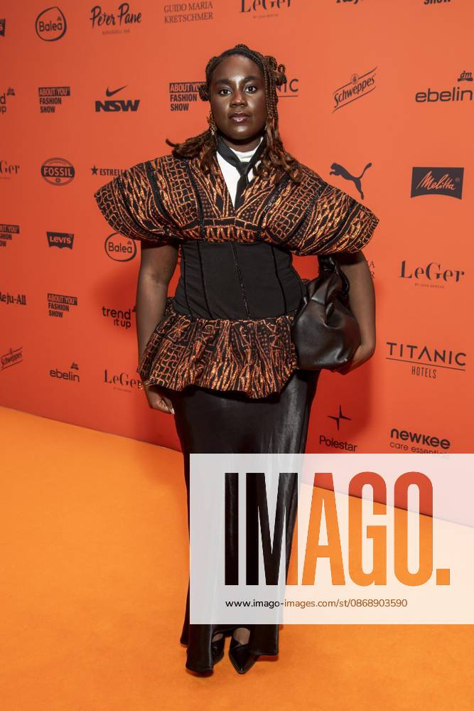 ABB ABOUTYOU Alexandra Rockson walks the Orange Carpet at the ABOUT YOU Opera Fashion Show at the Admiralspalast on October 7, 2026, in Berlin, Germany