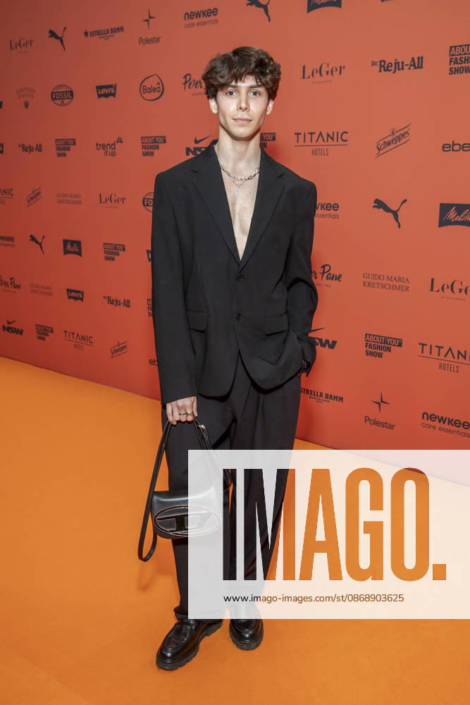 ABB ABOUTYOU Sascha Dombrowski as a guest on the orange carpet at the ABOUT YOU Opera Fashion Show at the Admiralspalast on October 7, 2026, in Berlin, Germany