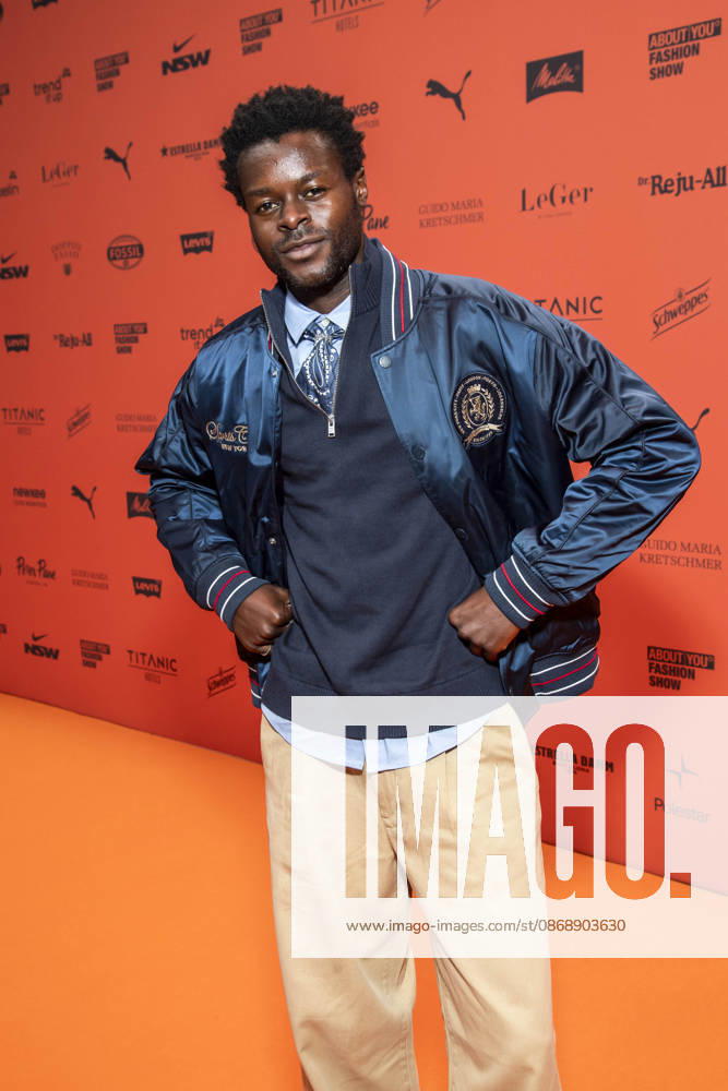 ABB ABOUTYOU Wil Johnson as a guest on the Orange Carpet at the ABOUT YOU Opera Fashion Show at the Admiralspalast on October 7, 2026, in Berlin, Germany