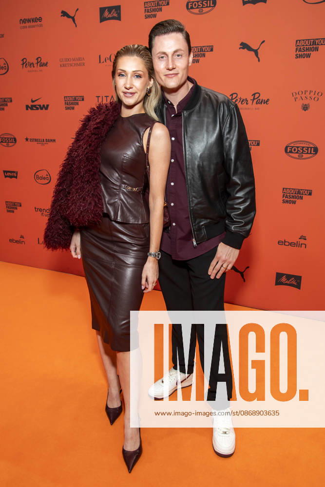 ABB ABOUTYOU Lisa Walser and Henry Walser as guests on the orange carpet at the ABOUT YOU Opera Fashion Show at the Admiralspalast on October 7, 2026, in Berlin, Germany