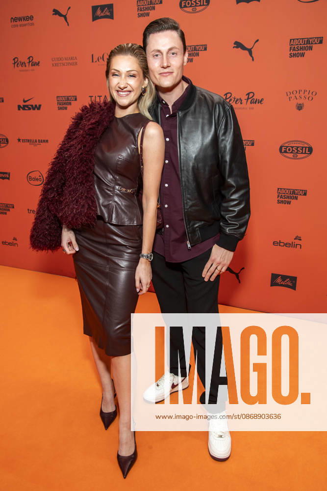 ABB ABOUTYOU Lisa Walser and Henry Walser as guests on the orange carpet at the ABOUT YOU Opera Fashion Show at the Admiralspalast on October 7, 2026, in Berlin, Germany