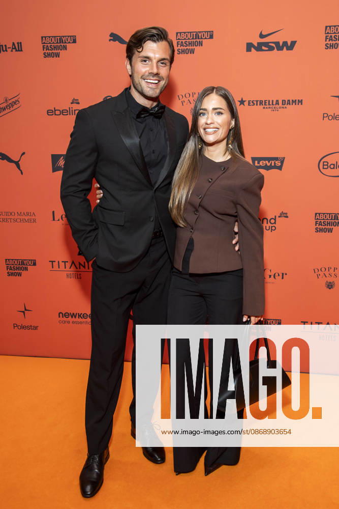 ABB ABOUTYOU Tim Reitz and Vivien Grabatis walk the Orange Carpet at the ABOUT YOU Opera Fashion Show at the Admiralspalast on October 7, 2026, in Berlin, Germany