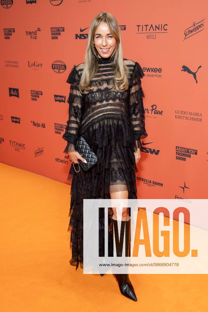 ABB ABOUTYOU Annemarie Carpendale makes a solo appearance on the Orange Carpet at the ABOUT YOU Opera Fashion Show at the Admiralspalast on October 7, 2026, in Berlin, Germany