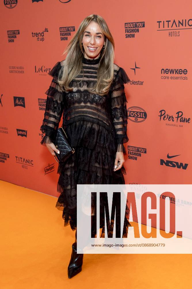 ABB ABOUTYOU Annemarie Carpendale makes a solo appearance on the Orange Carpet at the ABOUT YOU Opera Fashion Show at the Admiralspalast on October 7, 2026, in Berlin, Germany