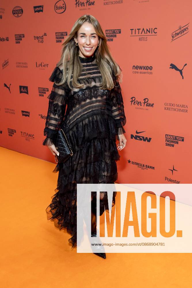 ABB ABOUTYOU Annemarie Carpendale makes a solo appearance on the Orange Carpet at the ABOUT YOU Opera Fashion Show at the Admiralspalast on October 7, 2026, in Berlin, Germany
