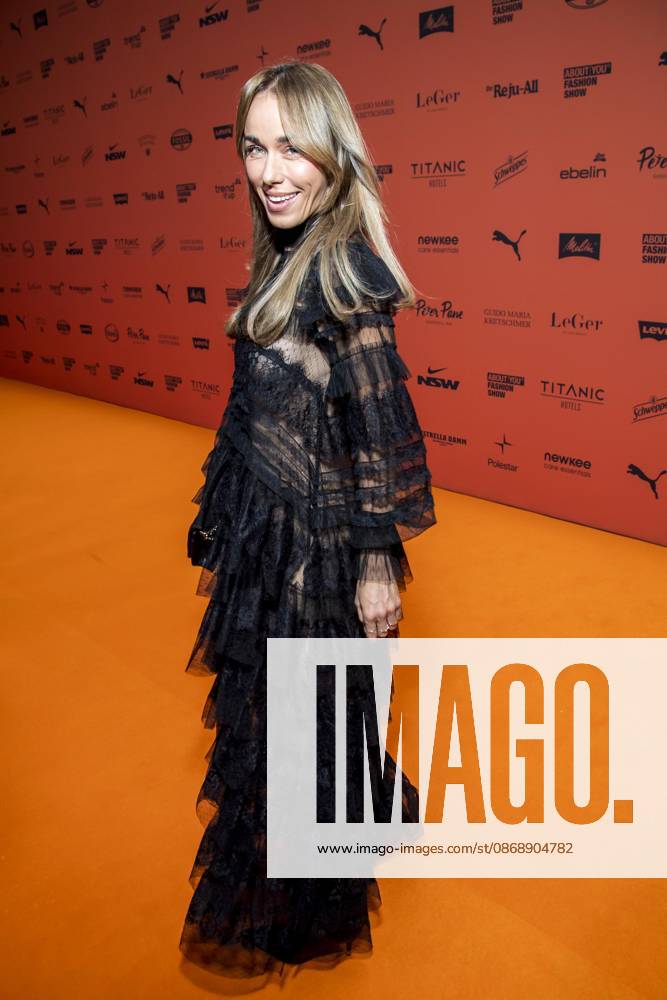 ABB ABOUTYOU Annemarie Carpendale makes a solo appearance on the Orange Carpet at the ABOUT YOU Opera Fashion Show at the Admiralspalast on October 7, 2026, in Berlin, Germany