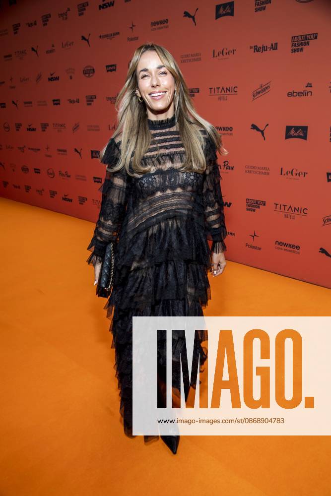 ABB ABOUTYOU Annemarie Carpendale makes a solo appearance on the Orange Carpet at the ABOUT YOU Opera Fashion Show at the Admiralspalast on October 7, 2026, in Berlin, Germany