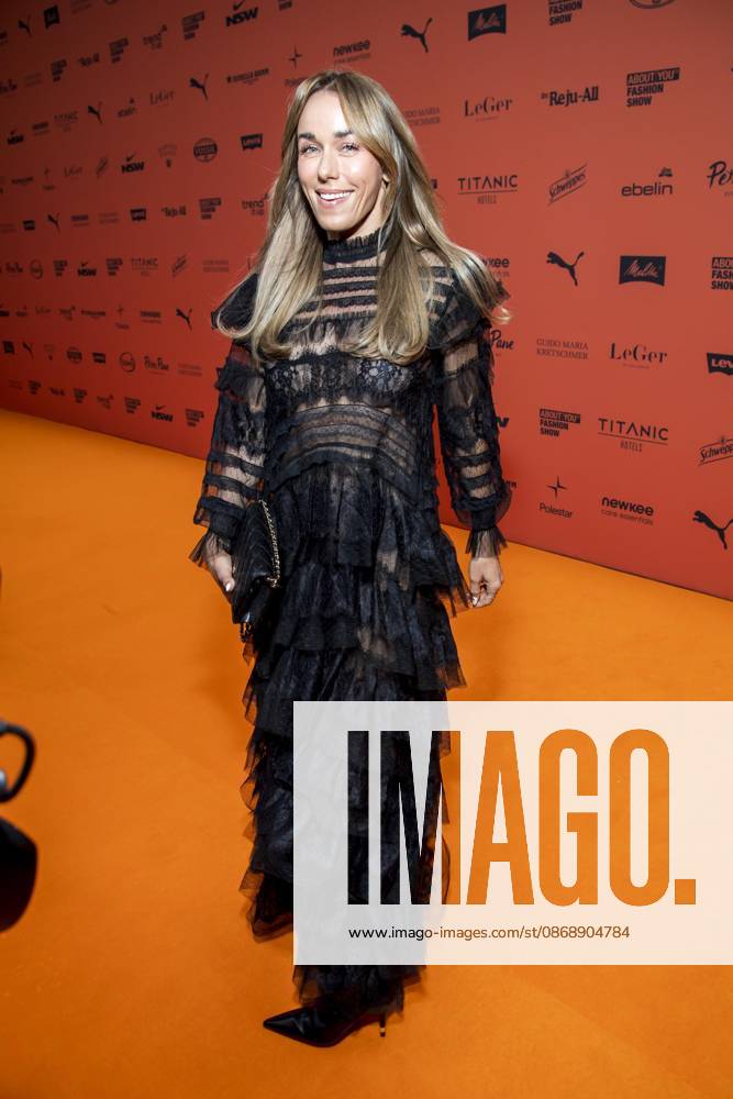 ABB ABOUTYOU Annemarie Carpendale makes a solo appearance on the Orange Carpet at the ABOUT YOU Opera Fashion Show at the Admiralspalast on October 7, 2026, in Berlin, Germany