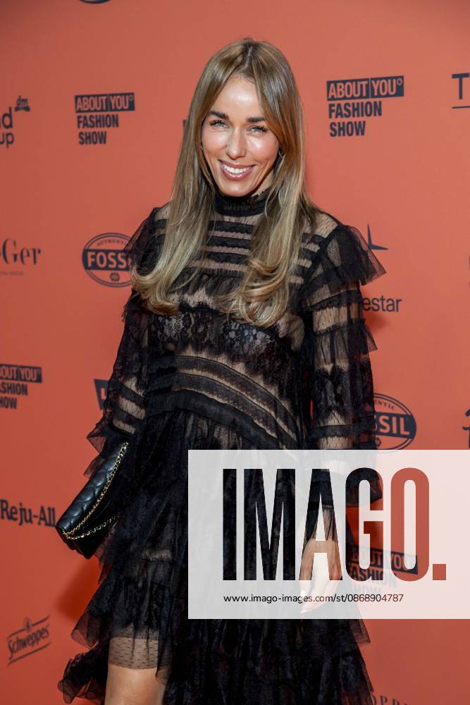 ABB ABOUTYOU Annemarie Carpendale makes a solo appearance on the Orange Carpet at the ABOUT YOU Opera Fashion Show at the Admiralspalast on October 7, 2026, in Berlin, Germany