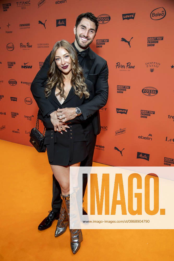 ABB ABOUTYOU Katja Geretschuchin and Dennis Grie as guests on the Orange Carpet at the ABOUT YOU Opera Fashion Show at the Admiralspalast on October 7, 2026, in Berlin, Germany