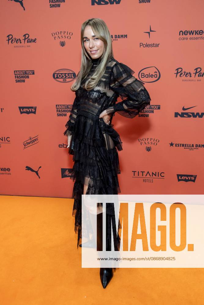 ABB ABOUTYOU Annemarie Carpendale makes a solo appearance on the Orange Carpet at the ABOUT YOU Opera Fashion Show at the Admiralspalast on October 7, 2026, in Berlin, Germany