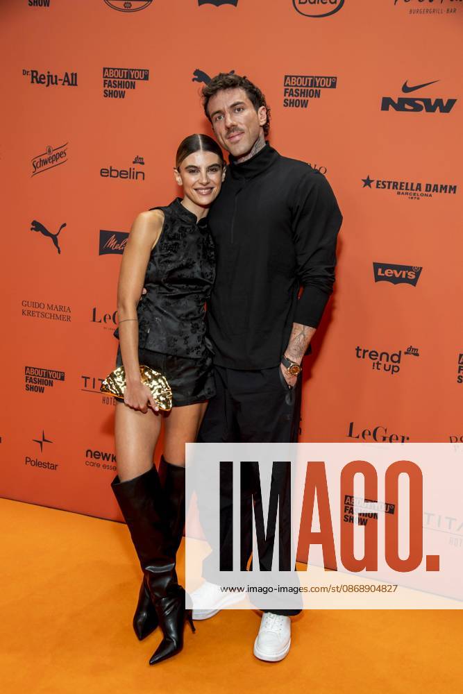ABB ABOUTYOU Katharina Gretschuchin and Dennis Gries as guests on the orange carpet at the ABOUT YOU Opera Fashion Show at the Admiralspalast on October 7, 2026, in Berlin, Germany
