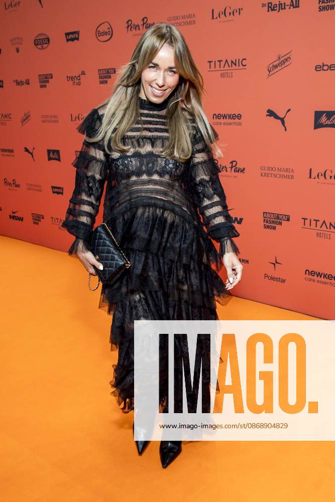 ABB ABOUTYOU Annemarie Carpendale makes a solo appearance on the Orange Carpet at the ABOUT YOU Opera Fashion Show at the Admiralspalast on October 7, 2026, in Berlin, Germany
