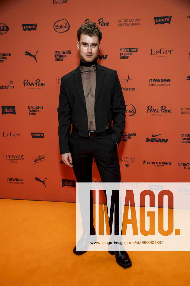 ABB ABOUTYOU s Linus Weber as a guest on the orange carpet at the ABOUT YOU Opera Fashion Show at the Admiralspalast on October 7, 2026, in Berlin, Germany