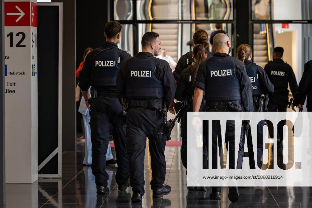 Frankfurt Book Fair 2026 August 10, 2026 Police presence on the second day of the 2026 Frankfurt Book Fair, Thursday. Numerous visitors, exhibitors, and industry professionals are making their way through the exhibition halls and aisles of the Frankfurt Exhibition Center. Police officers are on duty during the event and are e