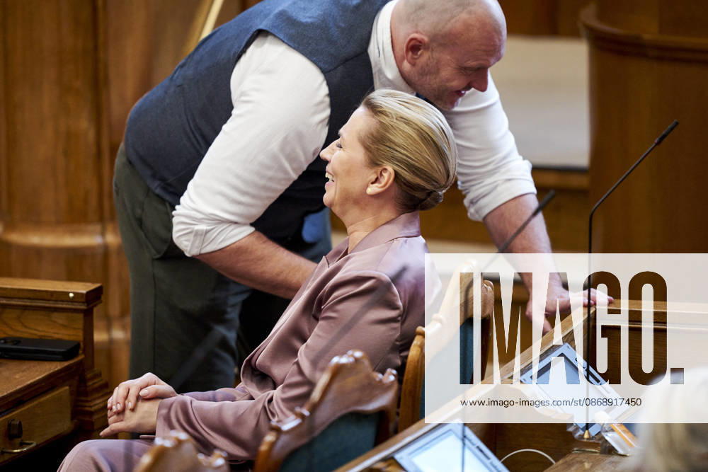 Opening debate in the Danish Parliament: Lars Boje Mathiesen of the Citizens Party and Prime Minister Mette Frederiksen of the Social Democratic Party chatting during the opening debate of the Danish Parliament in the Parliament Hall at Christiansborg on Thursday, October 8, 2026, Copenhagen, Denmark