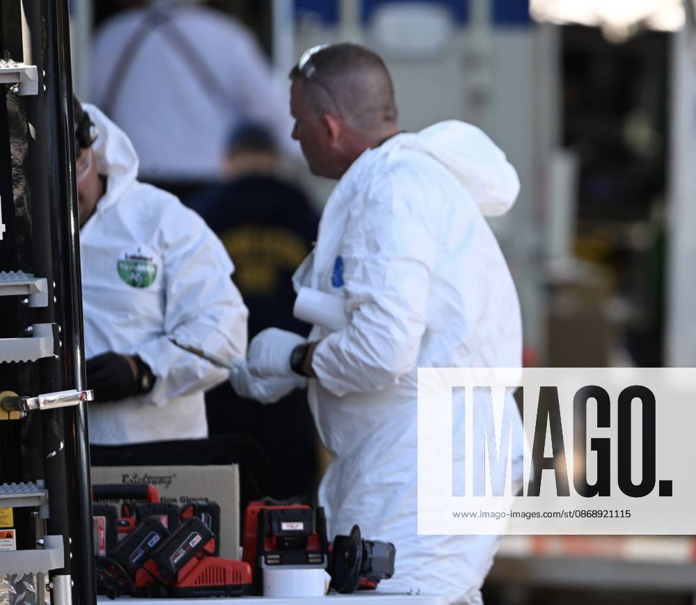 FBI agents seize evidence from the home of Eugene Horsch on West Chew Avenue in Philadelphia, Pennsylvania, United States, on October 7, 2026. Several evidence boxes and bags are visible, including one labeled drain trap and liquid contents. Authorities are investigating the property after linking it to at least seven missing women. Eugene Horsch is the son of the late Raymond R.C. Horsch. Philadelphia USA - ZUMAs197 20261007_aaa_s197_635