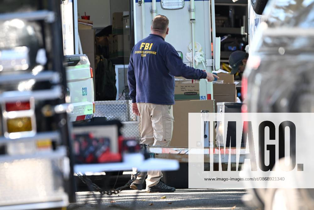 FBI agents seize evidence from the home of Eugene Horsch on West Chew Avenue in Philadelphia, Pennsylvania, United States, on October 7, 2026. Several evidence boxes and bags are visible, including one labeled drain trap and liquid contents. Authorities are investigating the property after linking it to at least seven missing women. Eugene Horsch is the son of the late Raymond R.C. Horsch. Philadelphia USA - ZUMAs197 20261007_aaa_s197_639