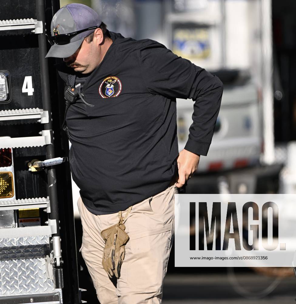 FBI agents seize evidence from the home of Eugene Horsch on West Chew Avenue in Philadelphia, Pennsylvania, United States, on October 7, 2026. Several evidence boxes and bags are visible, including one labeled drain trap and liquid contents. Authorities are investigating the property after linking it to at least seven missing women. Eugene Horsch is the son of the late Raymond R.C. Horsch. Philadelphia USA - ZUMAs197 20261007_aaa_s197_642