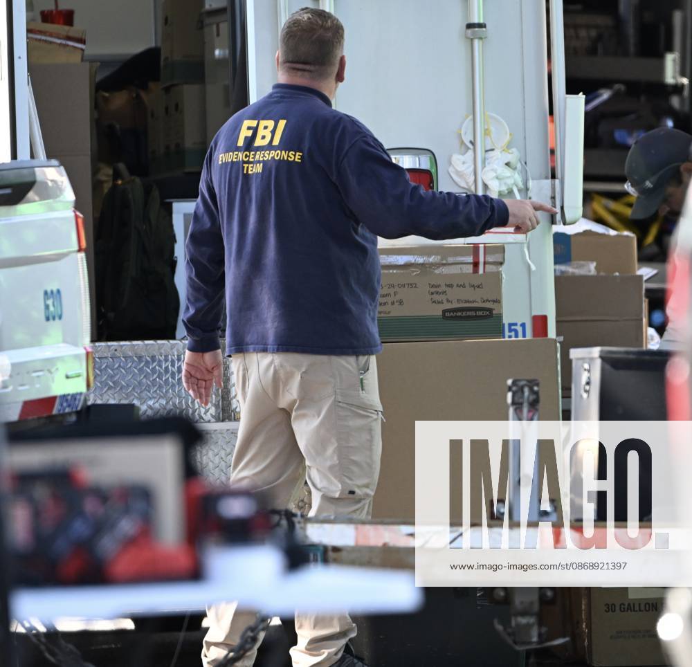 FBI agents seize evidence from the home of Eugene Horsch on West Chew Avenue in Philadelphia, Pennsylvania, United States, on October 7, 2026. Several evidence boxes and bags are visible, including one labeled drain trap and liquid contents. Authorities are investigating the property after linking it to at least seven missing women. Eugene Horsch is the son of the late Raymond R.C. Horsch. Philadelphia USA - ZUMAs197 20261007_aaa_s197_645