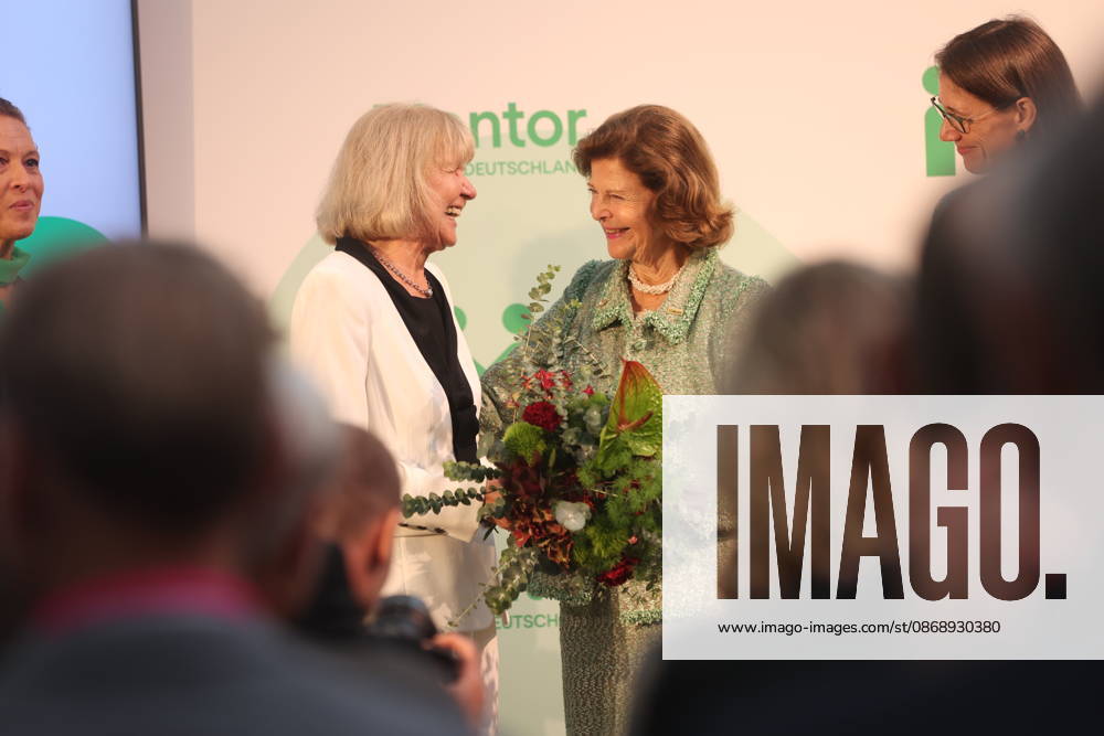 Queen Silvia of Sweden Presents Award on Mainau Island, Konstanz, Mainau, 0810 2026 Her Majesty Queen Silvia of Sweden presented the Mentor Award at a ceremony marking the 10th anniversary of the Mentor Foundation Germany. During the presentation, the award slipped from her hands and landed on the feet of the recipient. In Baden-Württemberg, Germany