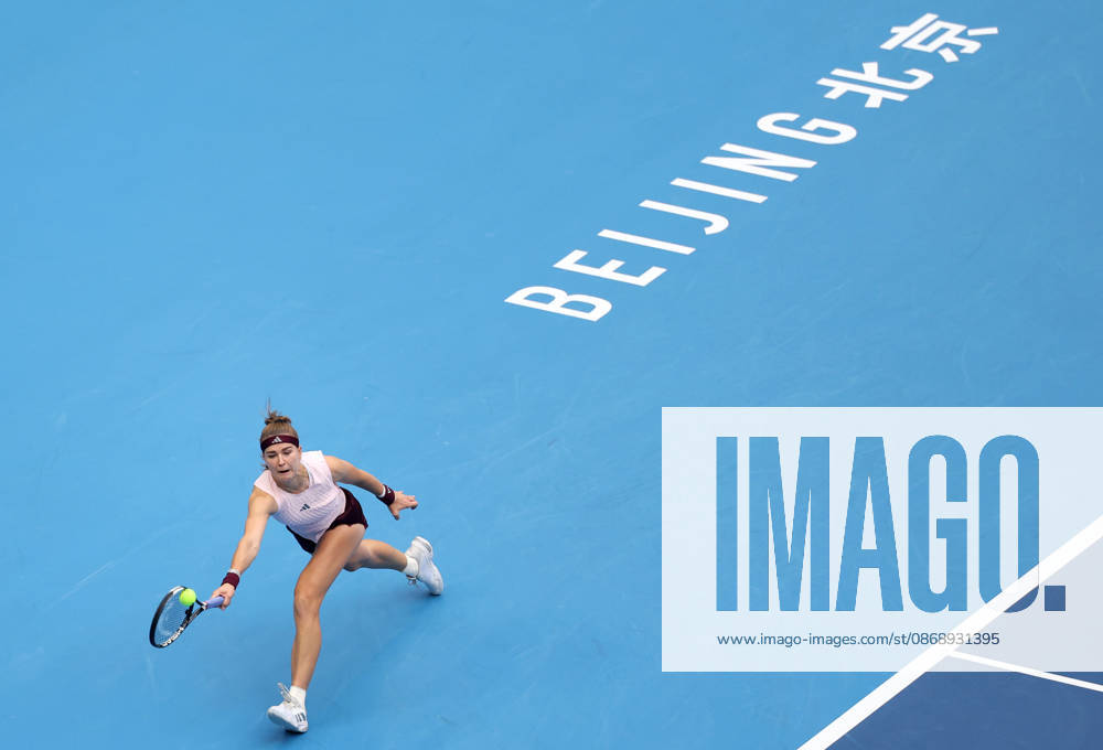 (261008) -- BEIJING, Oct. 8, 2026 -- Karolina Muchova of the Czech Republic hits a return during the women s singles quarterfinal match between Karolina Muchova of the Czech Republic and Nikola Bartunkova of the Czech Republic at 2026 China Open tennis tournament in Beijing, China, Oct. 8, 2026. ) (SP)CHINA-BEIJING-TENNIS-CHINA OPEN-WOMEN S SINGLES (CN) ZhangxChenlin