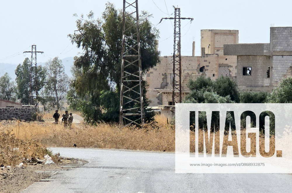 Israeli army conducts raids in Syria s Quneitra countryside QUNEITRA, SYRIA - OCTOBER 8: Israeli forces patrol the village as they conduct raids in residential areas and fire harassment shots at open areas in the countryside of Quneitra, southern Syria, on October 8, 2026. Huseyin Mesal Anadolu Quneitra Syria. Editorial use only. Please get in touch for any other usage.