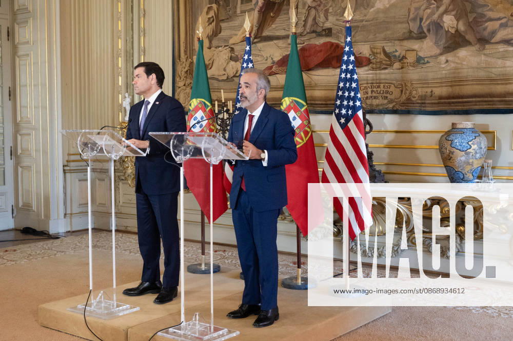 Portugal s Minister of State and Foreign Affairs PAULO RANGEL speaks at a lectern during a joint press conference with U.S. Secretary of State MARCO RUBIO, left, at Palacio das Necessidades in Lisbon, Portugal, on October 8, 2026. The media appearance followed their bilateral meeting during RUBIO s visit to advance defense, economic and technology cooperation. Lisbon Portugal - ZUMAr238 20261008_zip_r238_006