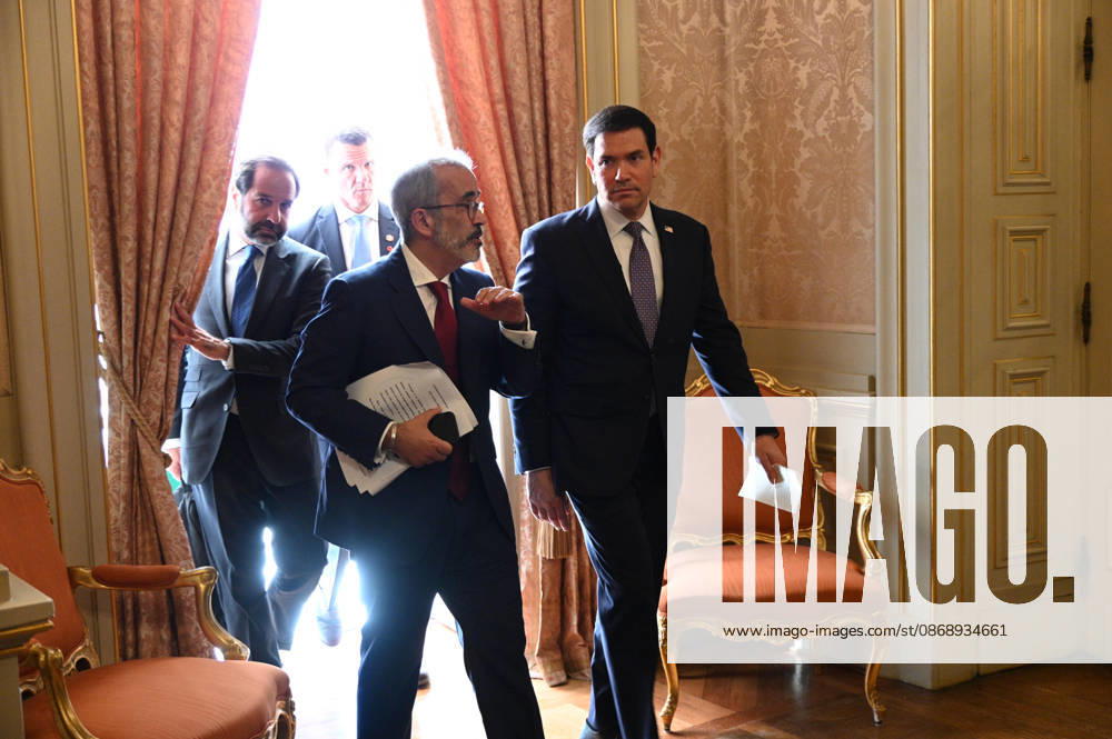 Portuguese Minister of State and Foreign Affairs PAULO RANGEL, left, gestures while walking alongside U.S. Secretary of State MARCO RUBIO as they leave their joint press conference at Palacio das Necessidades in Lisbon, Portugal, on October 8, 2026. The media appearance followed their bilateral meeting during RUBIO s visit to Portugal. Lisbon Portugal - ZUMAr238 20261008_zip_r238_017
