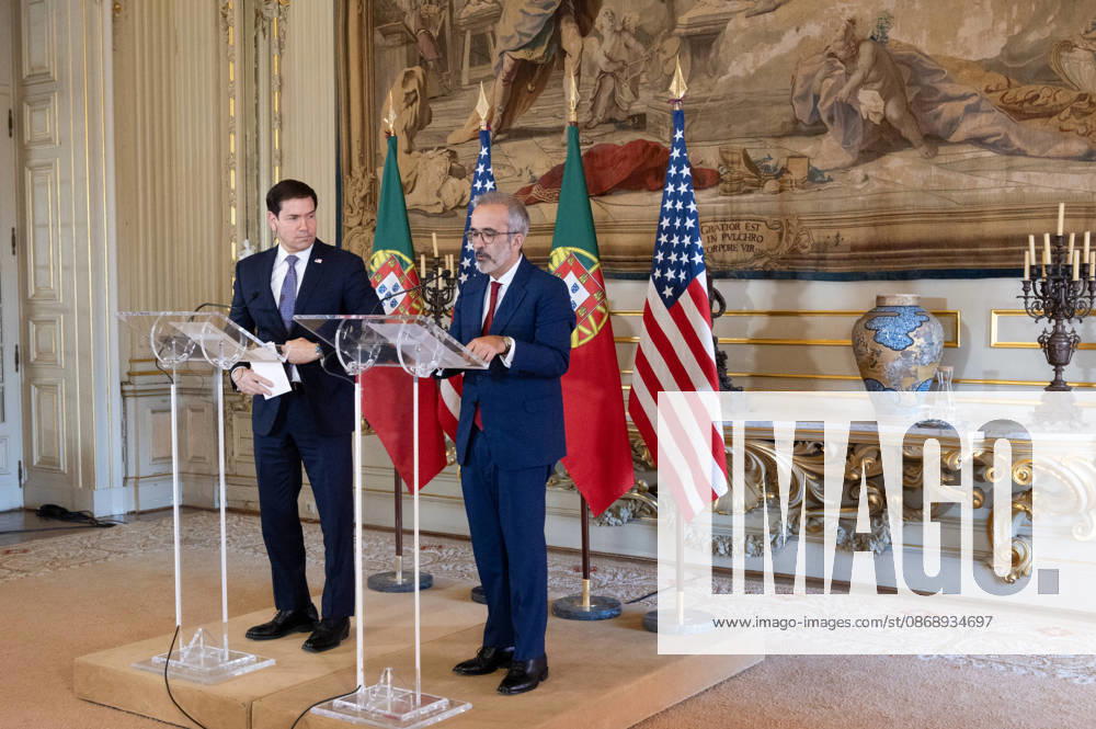 Portugal s Minister of State and Foreign Affairs PAULO RANGEL, right, speaks at a lectern as U.S. Secretary of State MARCO RUBIO listens during their joint press conference at Palacio das Necessidades in Lisbon, Portugal, on October 8, 2026. The media appearance follows their bilateral meeting during RUBIO s visit to advance defense, economic and technology cooperation. Lisbon Portugal - ZUMAr238 20261008_zip_r238_020