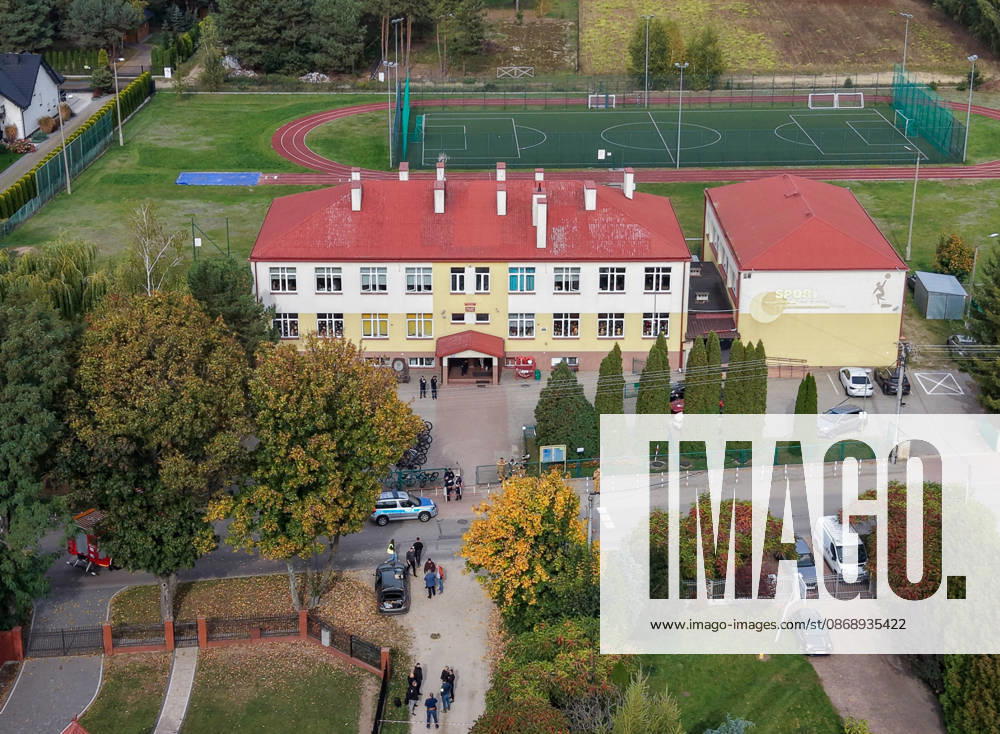 Stabbing attack at a primary school in Poland Photo: Wojciech Olkusnik East News A drone picture shows the school and surroundings after a knife attack at the local primary school on October 8, 2026 in the village of Leszczydol-Nowiny in central Poland, approximately 60 km north-east of Warsaw. A 15-year-old school graduate entered the building armed with a knife and fatally stabbed the janitor and wounded two teachers trying to overpower him. According to the police the perpetrator was wearing a helmet with a camera and planned to record the attack. A day earlier a stabbing attack, where nine people were wounded, occurred in a vocational school in the town of Ostroleka, 50 km north of today s site. EN_01685559_0050