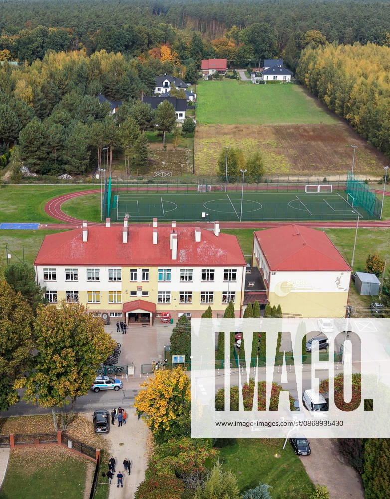 Stabbing attack at a primary school in Poland Photo: Wojciech Olkusnik East News A drone picture shows the school and surroundings after a knife attack at the local primary school on October 8, 2026 in the village of Leszczydol-Nowiny in central Poland, approximately 60 km north-east of Warsaw. A 15-year-old school graduate entered the building armed with a knife and fatally stabbed the janitor and wounded two teachers trying to overpower him. According to the police the perpetrator was wearing a helmet with a camera and planned to record the attack. A day earlier a stabbing attack, where nine people were wounded, occurred in a vocational school in the town of Ostroleka, 50 km north of today s site. EN_01685559_0052