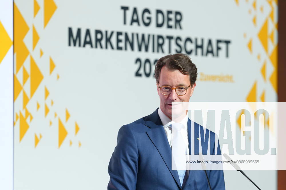 Brand Economy Day 2026 NRW: Minister President Hendrik Wuest on stage delivering his laudatory speech for Tim Hottges, winner of the Mensch Marke award, at Brand Economy Day 2026, Berlin, October 8, 2026, Berlin, Germany