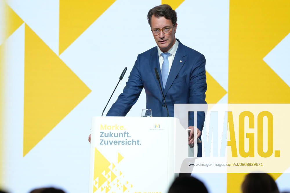 Brand Economy Day 2026 NRW: Minister President Hendrik Wuest on stage delivering his laudatory speech for Tim Hottges, winner of the Mensch Marke award, at Brand Economy Day 2026, Berlin, October 8, 2026, Berlin, Germany