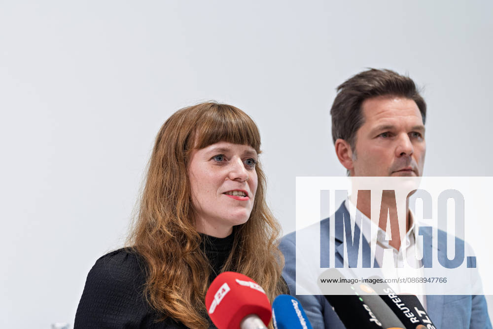 Kerstin Wolter Ehling of Die Linke speaks into the media microphones alongside Steffen Krach of the SPD during a joint press statement following the conclusion of their parties’ preliminary talks in the foyer of the Haus der Statistik Press statement by Die Linke, the Greens, and the SPD in Berlin