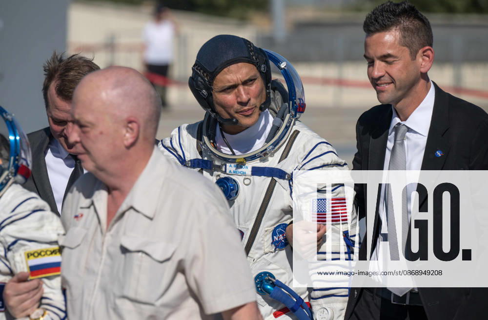 Baikonur, Kazakhstan. 14 July, 2026. NASA astronaut Anil Menon walks with NASA Deputy Administrator Matt Anderson, left, and NASA Administrator Jared Isaacman to board the Soyuz MS-29 spacecraft at the Baikonur Cosmodrome, July 14, 2026 in Baikonur, Kazakhstan. Menon launched to the International Space Station with Anna Kikina and Pyotr Dubrov. Baikonur Kazakhstan - ZUMAp138 20261008_zaa_p138_055