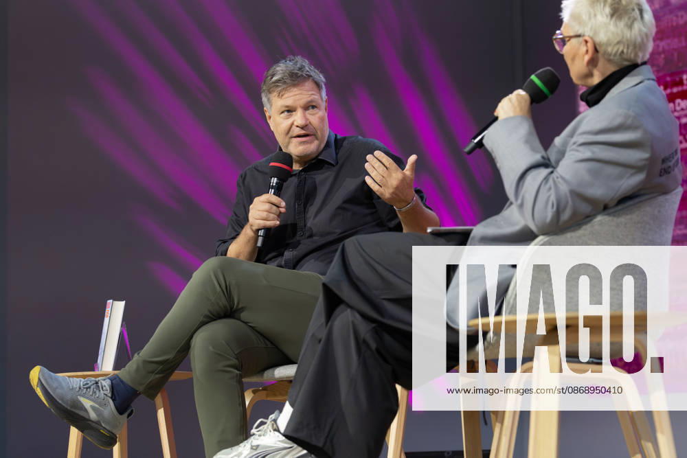 Frankfurt Book Fair 2026: Robert Habeck presents his new book, *Arctic Meltdown*, on the literature stage hosted by ARD, ZDF, and 3sat. In the foreground on the right is host Bärbel Schäfer. Frankfurt am Main, Hesse, Germany. Exhibition grounds.