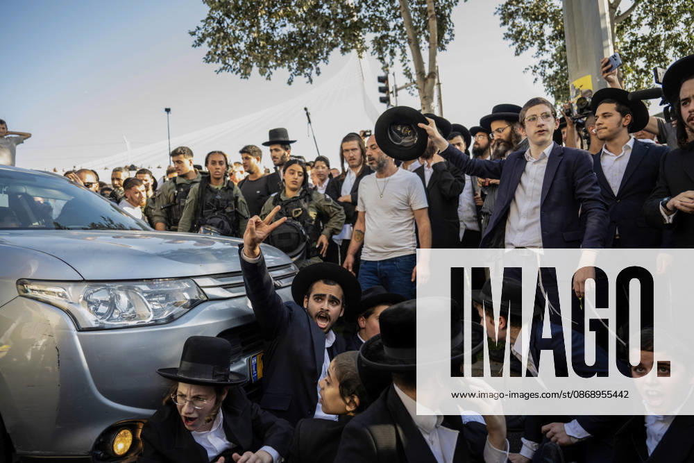 Anti-military service Ultra-Orthodox Jews block road to West Jerusalem JERUSALEM - OCTOBER 8: Ultra-Orthodox Jews, known as Haredi, protest the lack of legislation exempting yeshiva students from mandatory military service and the detention of students on grounds of draft evasion in West Jerusalem, on October 8, 2026. Haredi protesters lie on the road leading to West Jerusalem and block traffic, while Israeli police deployed to the scene intervene against the demonstrators. Mostafa Alkharouf Anadolu Jerusalem Israel. Editorial use only. Please get in touch for any other usage.