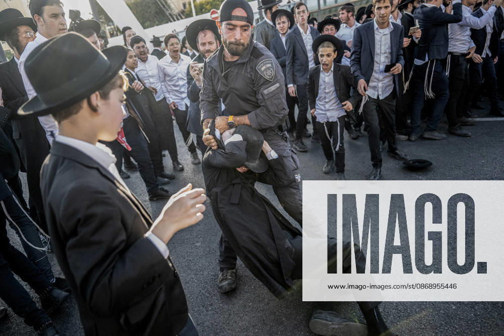 Anti-military service Ultra-Orthodox Jews block road to West Jerusalem JERUSALEM - OCTOBER 8: Israeli police deployed to the scene intervene against the demonstrators as Ultra-Orthodox Jews, known as Haredi, protest the lack of legislation exempting yeshiva students from mandatory military service and the detention of students on grounds of draft evasion in West Jerusalem, on October 8, 2026. Haredi protesters lie on the road leading to West Jerusalem and block traffic. Mostafa Alkharouf Anadolu Jerusalem Israel. Editorial use only. Please get in touch for any other usage.