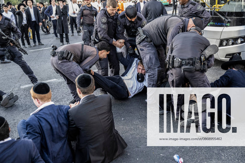 Anti-military service Ultra-Orthodox Jews block road to West Jerusalem JERUSALEM - OCTOBER 8: Israeli police deployed to the scene intervene against the demonstrators as Ultra-Orthodox Jews, known as Haredi, protest the lack of legislation exempting yeshiva students from mandatory military service and the detention of students on grounds of draft evasion in West Jerusalem, on October 8, 2026. Haredi protesters lie on the road leading to West Jerusalem and block traffic. Mostafa Alkharouf Anadolu Jerusalem Israel. Editorial use only. Please get in touch for any other usage.