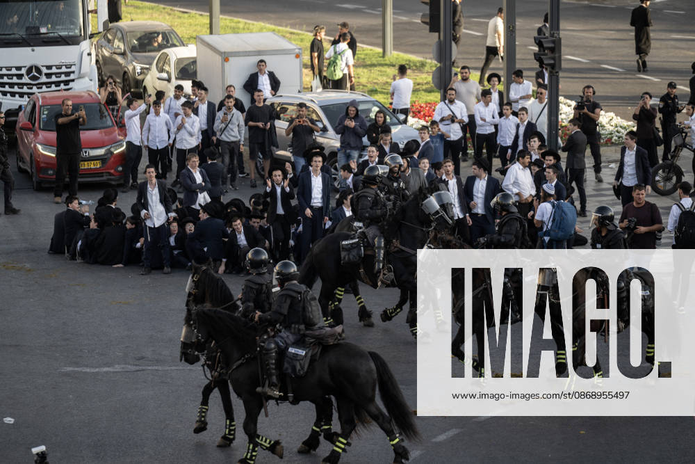 Anti-military service Ultra-Orthodox Jews block road to West Jerusalem JERUSALEM - OCTOBER 8: Mounted Israeli police officers on horseback deployed to the scene intervene against demonstrators as Ultra-Orthodox Jews, known as Haredi, protest the lack of legislation exempting yeshiva students from mandatory military service and the detention of students on grounds of draft evasion in West Jerusalem, Israel, on October 8, 2026. Haredi protesters lie on the road leading to West Jerusalem and block traffic. Mostafa Alkharouf Anadolu Jerusalem Israel. Editorial use only. Please get in touch for any other usage.